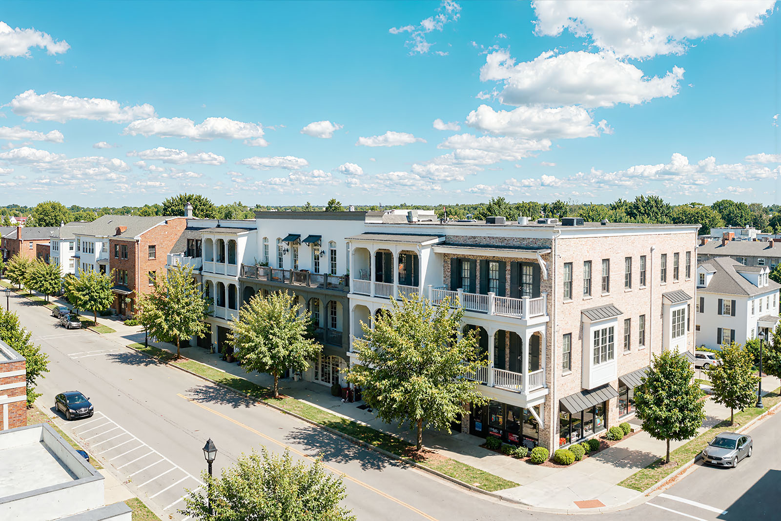 Modern real estate portfolio showing living, working, and shopping assets in a growing city